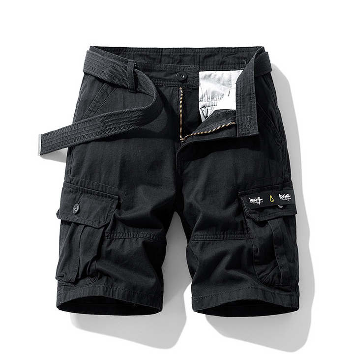 Man wearing navy cargo shorts for casual daily wear, showcasing versatile men's fashion & comfort.