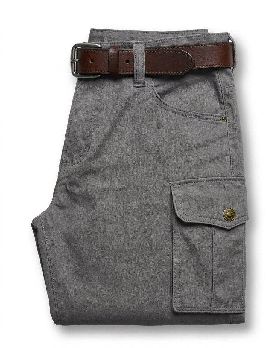 Rugged men's leather cargo pants, heavy-duty design for durability, suitable for workwear & outdoor gear.