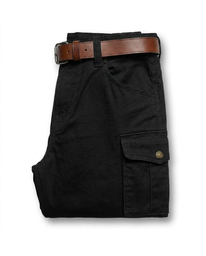 Navy blue men's durable leather cargo pants, relaxed fit, combining utility wear with rugged outdoor fashion.