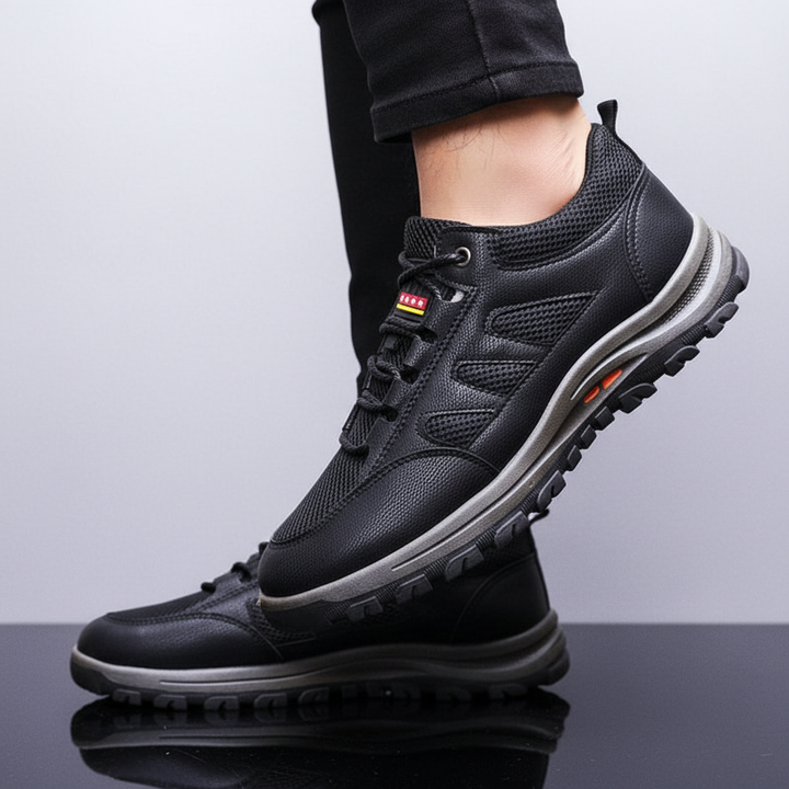 Close-up of men's robust leather outdoor footwear with sturdy laces
