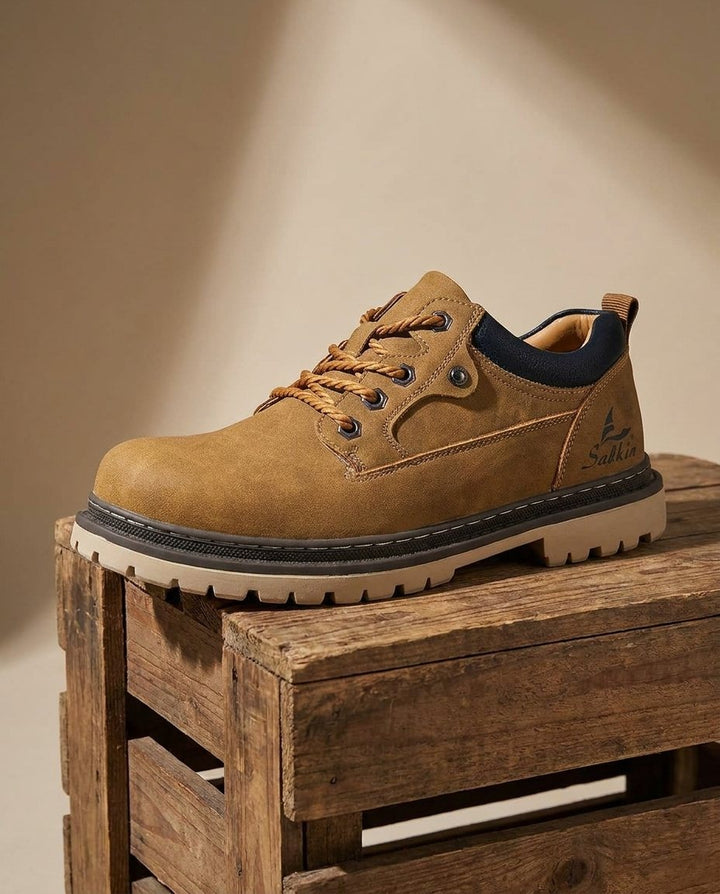 Comfortable men's leather work boots for all-day wear. Durable, stylish, and built for rugged terrain.