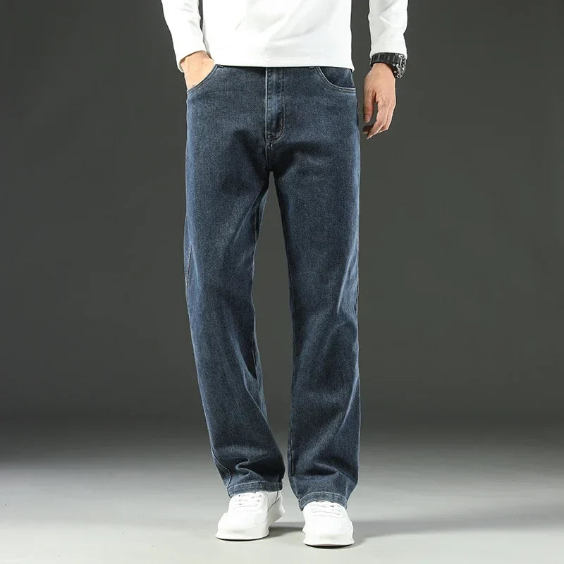 Multi-pocket men's carpenter jeans, designed with a relaxed fit & durable denim for utility work.