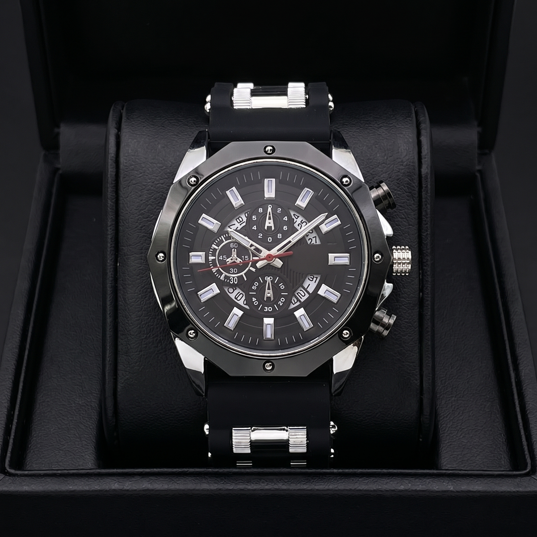 Close-up of men's black gold stainless steel watch dial with rectangular markers & sapphire crystal.