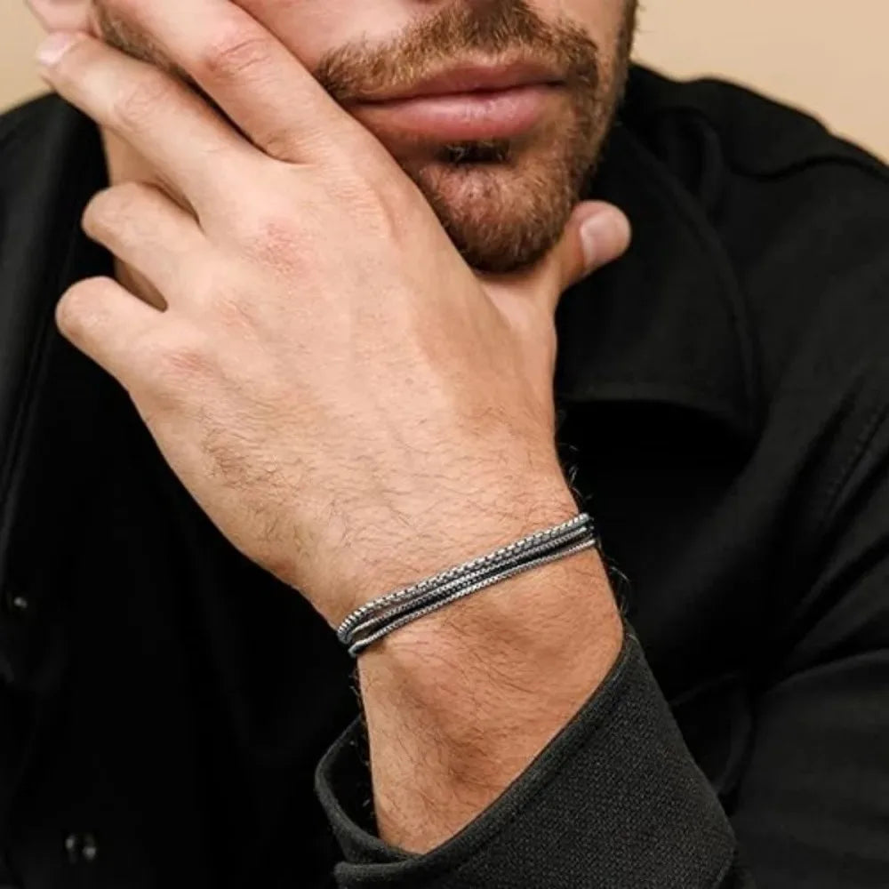 Sleek silver men's steel bracelet, adjustable fit. A durable, sweatproof & anti-scratch accessory.