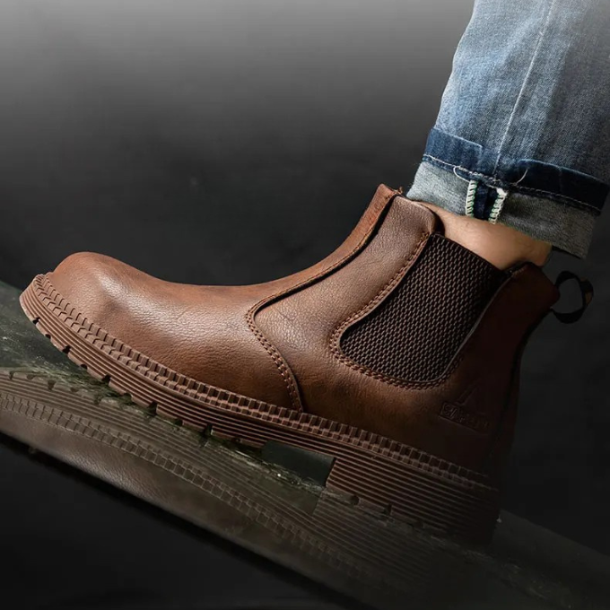 Rugged men's durable steel toe Chelsea boots, perfect workwear with excellent traction.