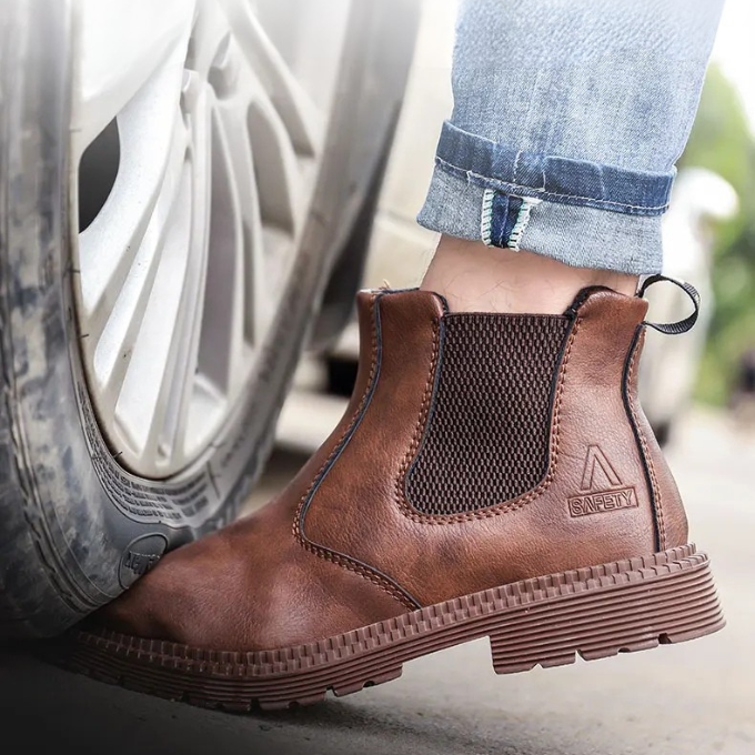 Stylish and tough men's steel toe Chelsea boots, ideal for work and safety, slip-on design.