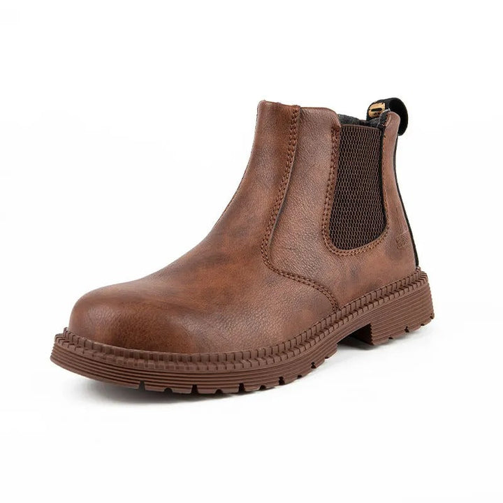 Heavy-duty men's steel toe Chelsea boots, robust workwear with strong traction and durability.