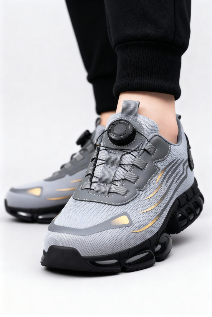 Breathable men's safety sneakers with steel toe protection, ideal for long hours on the job.