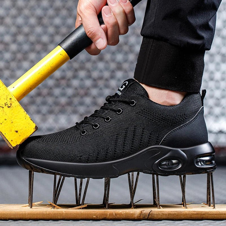 Steel toe protection on men's work boots, essential safety footwear for tough construction & warehouse environments.