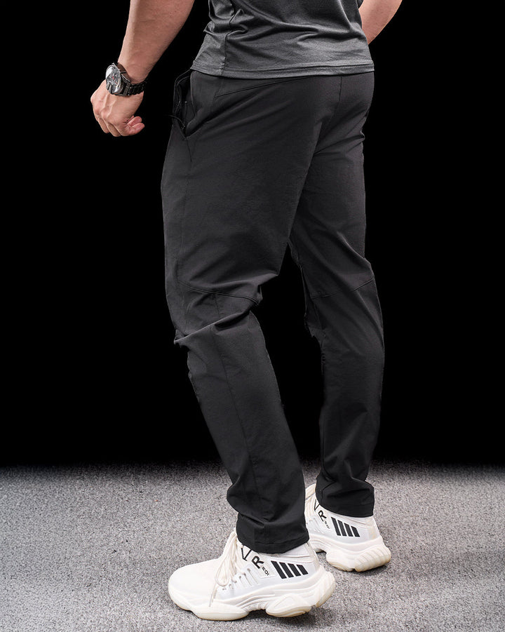 Men's resilient stretch pants for outdoor exploration. Quick-dry and durable for active wear.