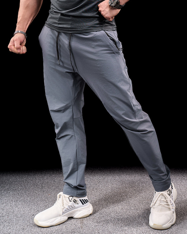 Men's versatile activewear pants. Durable stretch design for hiking, camping, & exploration.
