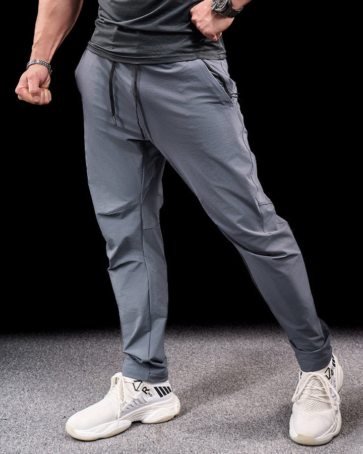 Men's versatile activewear pants. Durable stretch design for hiking, camping, & exploration.