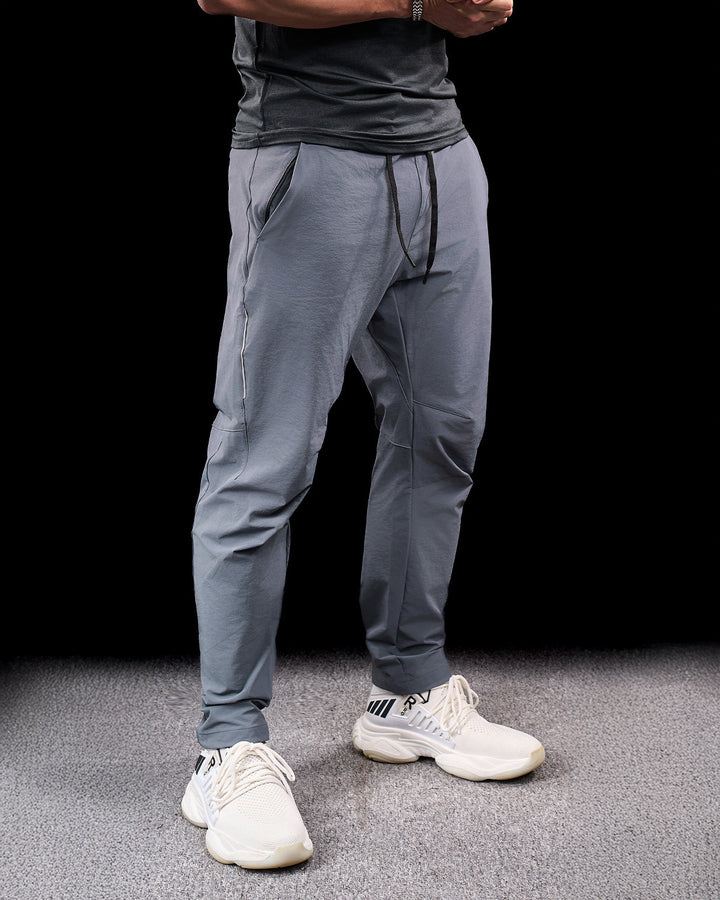 High-performance men's adventure pants. Stretch, quick-dry, and durable outdoor gear.