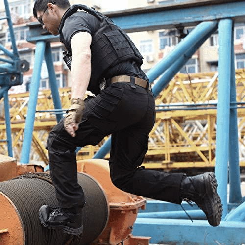 Men's durable cargo trousers with ample pockets, great for tactical outdoor use & utility.