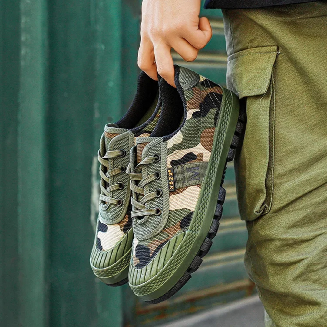 Rugged men's camo work boots, durable all-terrain tactical sneakers for tough outdoor adventures.