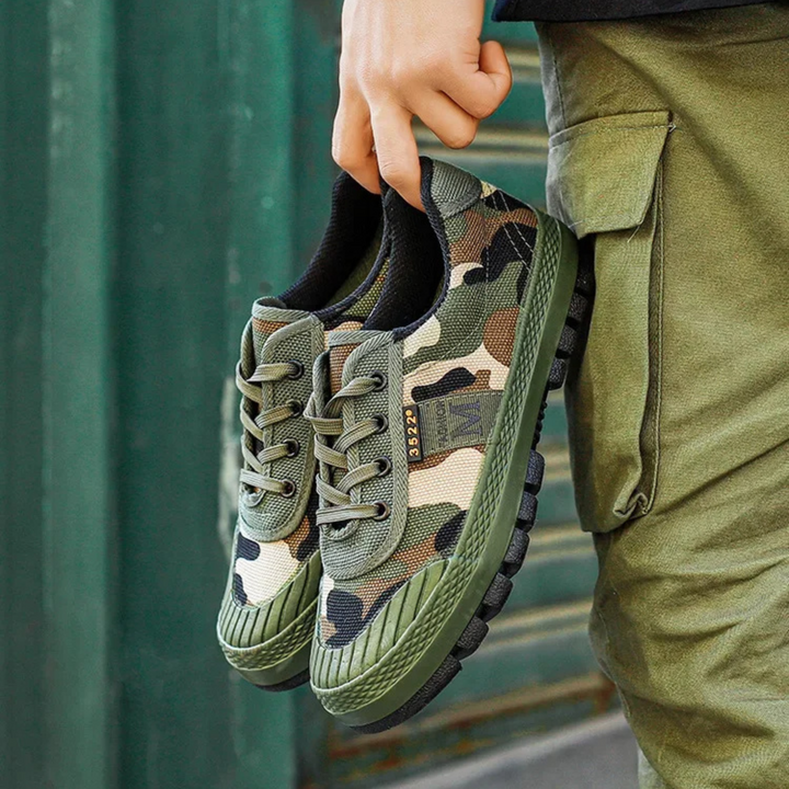 Rugged men's camo work boots, durable all-terrain tactical sneakers for tough outdoor adventures.