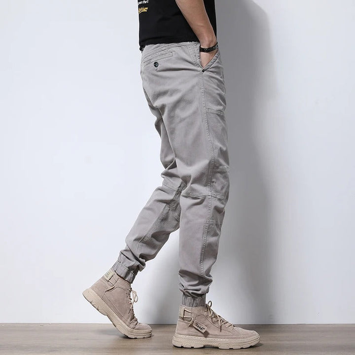 Men's utility cargo joggers, durable urban style for everyday active fashion.