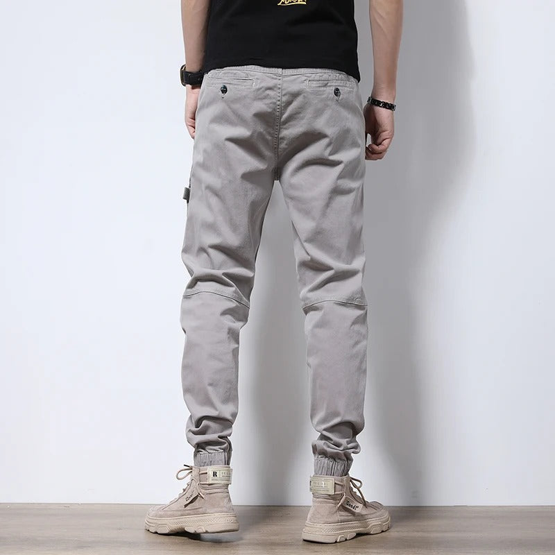 Durable men's urban cargo joggers, cotton blend for comfort & active fashion.