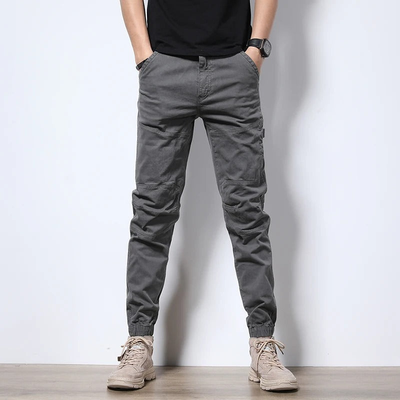 Men's everyday cargo joggers, reinforced & durable for urban comfort & style.