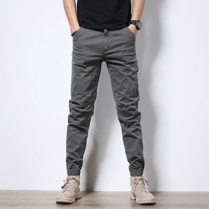 Men's everyday cargo joggers, reinforced & durable for urban comfort & style.