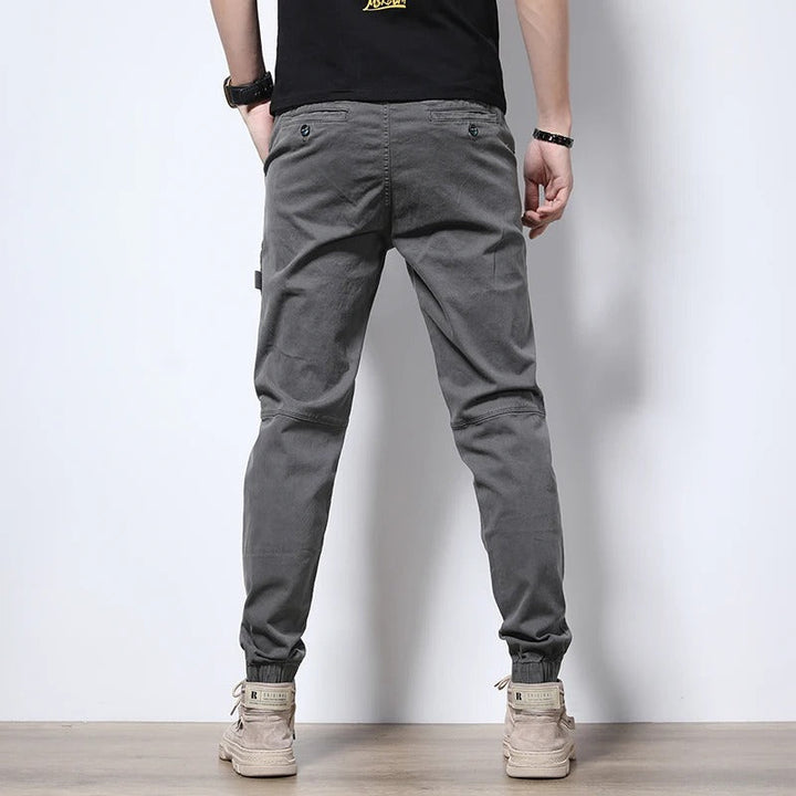 Urban men's reinforced joggers, durable cotton blend cargo pants for casual & active.