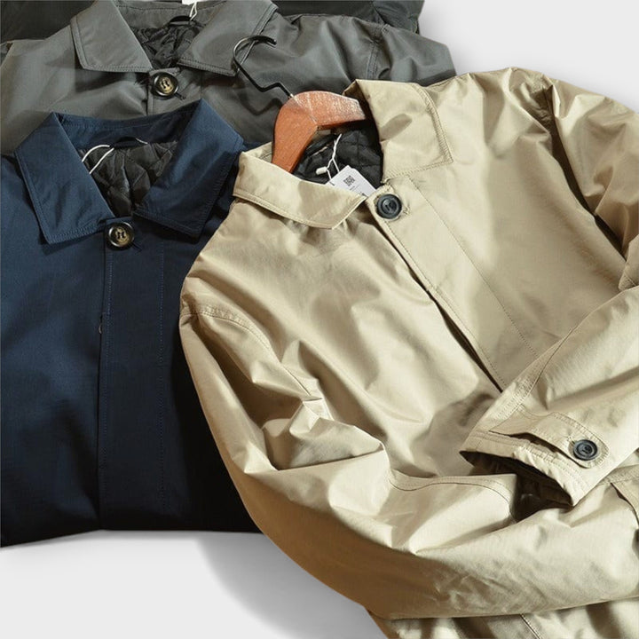 Durable men's all-season weatherproof coat. Insulated winter jacket, rain & wind protection.
