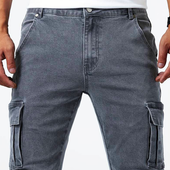 Men's cargo jeans, dynamic fit with multiple pockets, comfortable for everyday wear.