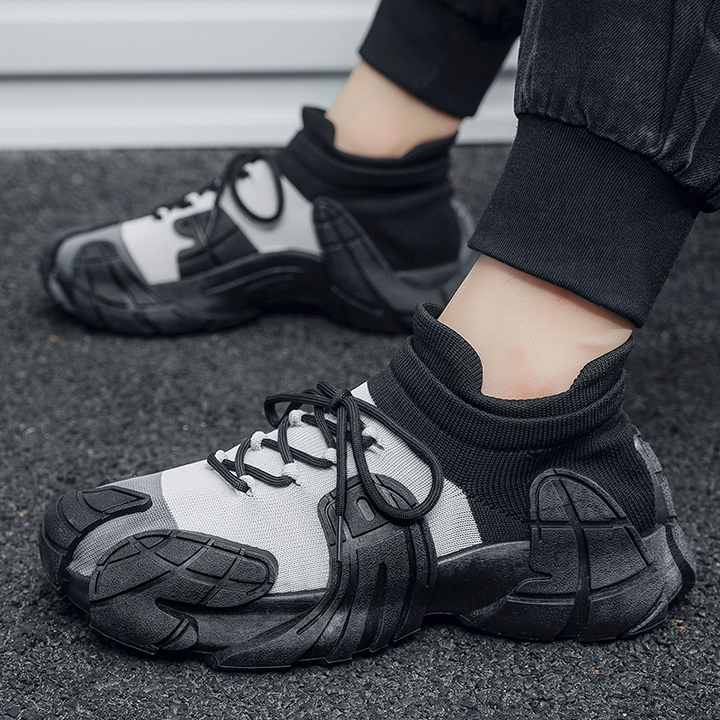 Slip-on men's hybrid athletic sneakers. Dynamic design, cushioned sole, & breathable for everyday active comfort.