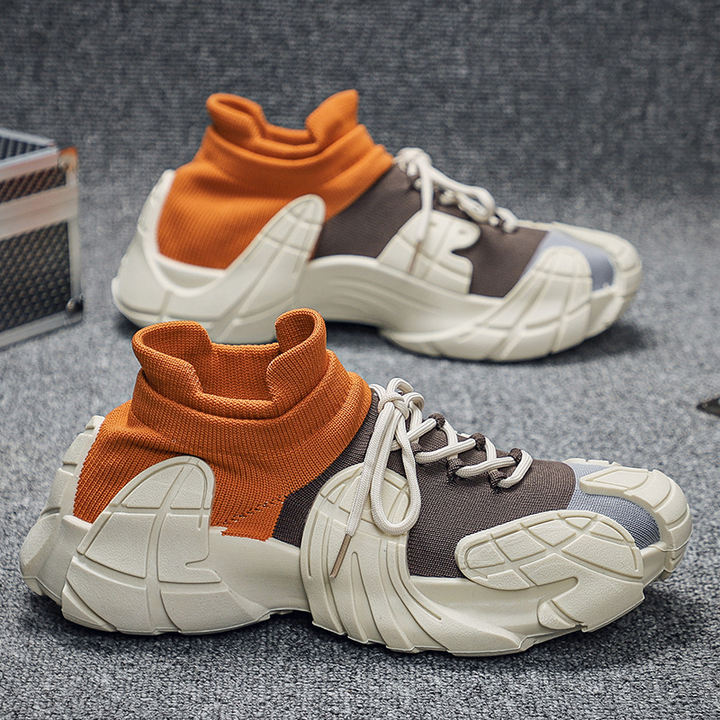 Dynamic men's slip-on sneakers featuring a sock collar, cushioned sole, & lightweight design for ultimate comfort.