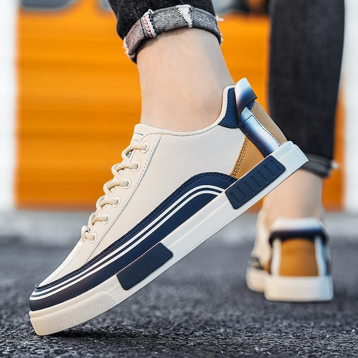 Stylish mens dynamic street sneakers. Lace-up design, cushioned for comfort, ideal for urban walking.