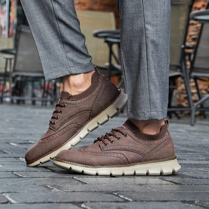 Side view of men's Eastbrook casual sneakers, showcasing sleek design & orthopedic features.