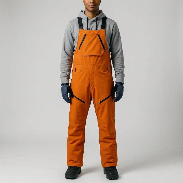 Close-up of men's thermal-lined snowboard trousers, showing waterproof fabric and zipper pocket