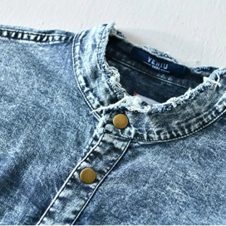 Men's long sleeve blue denim shirt. Modern fit, collarless with edgy raw hem. Perfect for casual layering.
