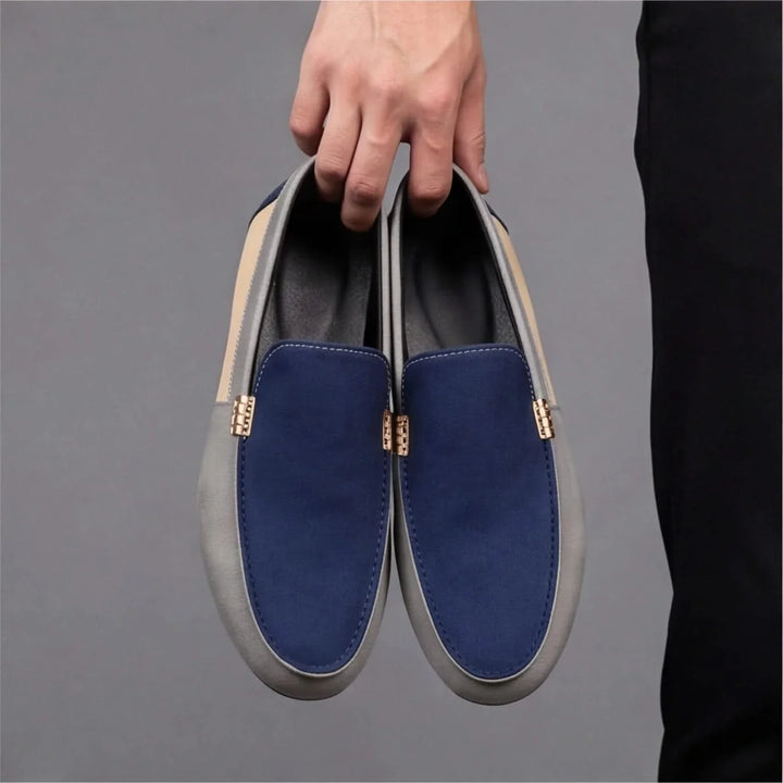 Close-up of men's blue slip-on loafers, showcasing the comfortable design and casual aesthetic.