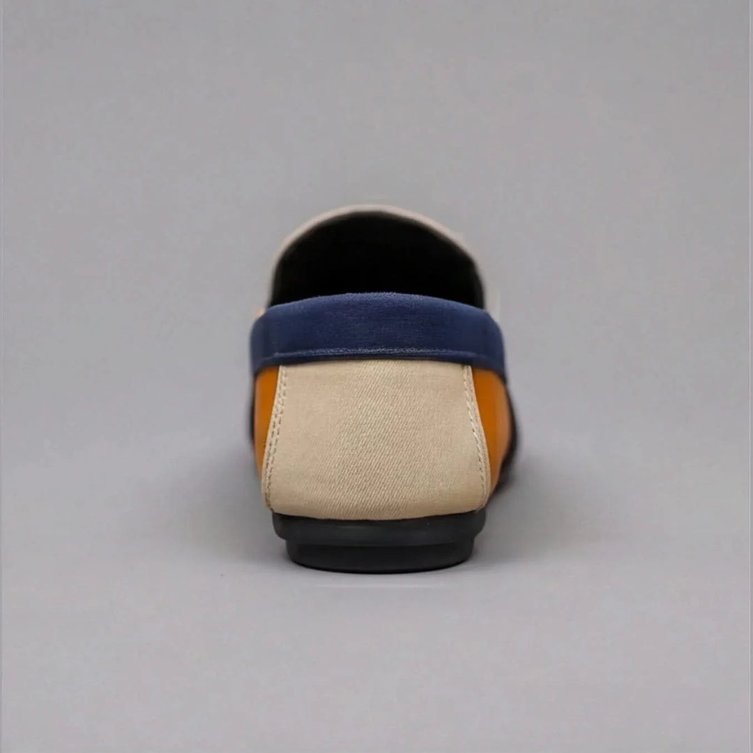 Man wearing men's slip-on loafers, demonstrating their easy wear and suitability for casual fashion.