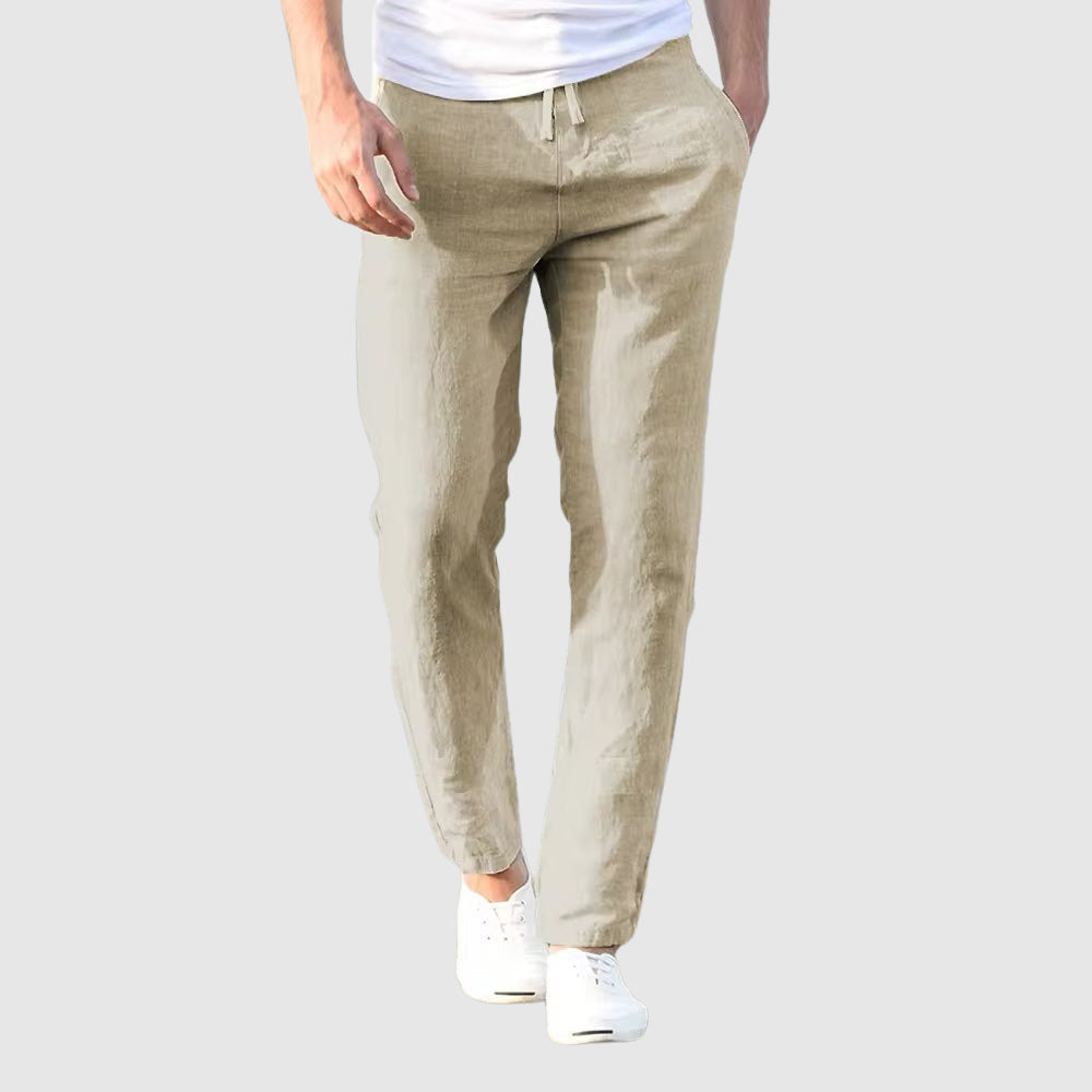 Drawstring waist detail on men's relaxed fit comfort pants, offering adjustable, effortless wear.