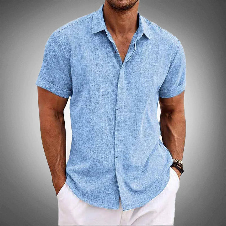 Men's effortless short-sleeve shirt in blue, cool & wrinkle-resistant for stylish summer casual wear.