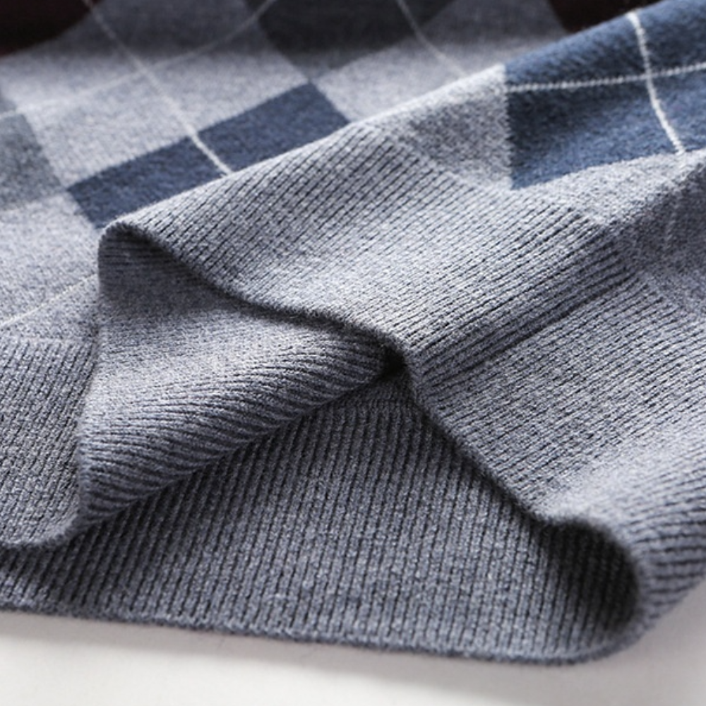 Blue & grey argyle V-neck sweater vest for men. Classic elegant layering in men's fashion.