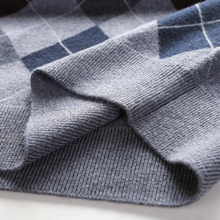 Blue & grey argyle V-neck sweater vest for men. Classic elegant layering in men's fashion.