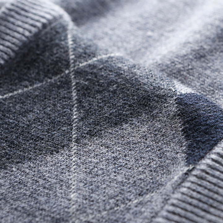 V-neck argyle sweater vest for men. Elegant classic menswear, perfect for layering outfits.