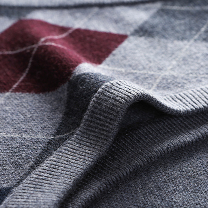 Modern classic men's argyle V-neck sweater vest. Sophisticated layering menswear.