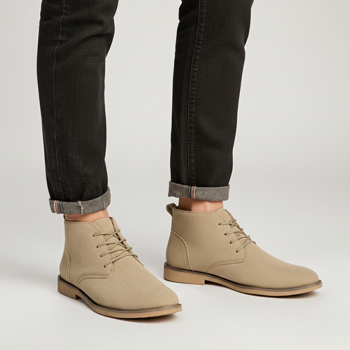 Stylish men's black lace-up ankle boots made from faux suede, perfect for elegant wear.