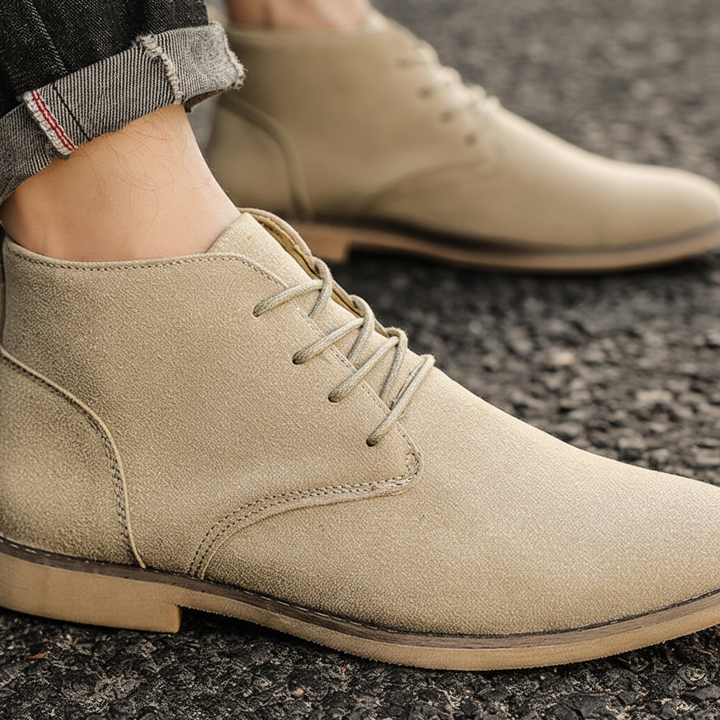 Classic men's black dress boots with lace-up detail, offering comfortable and elegant footwear.