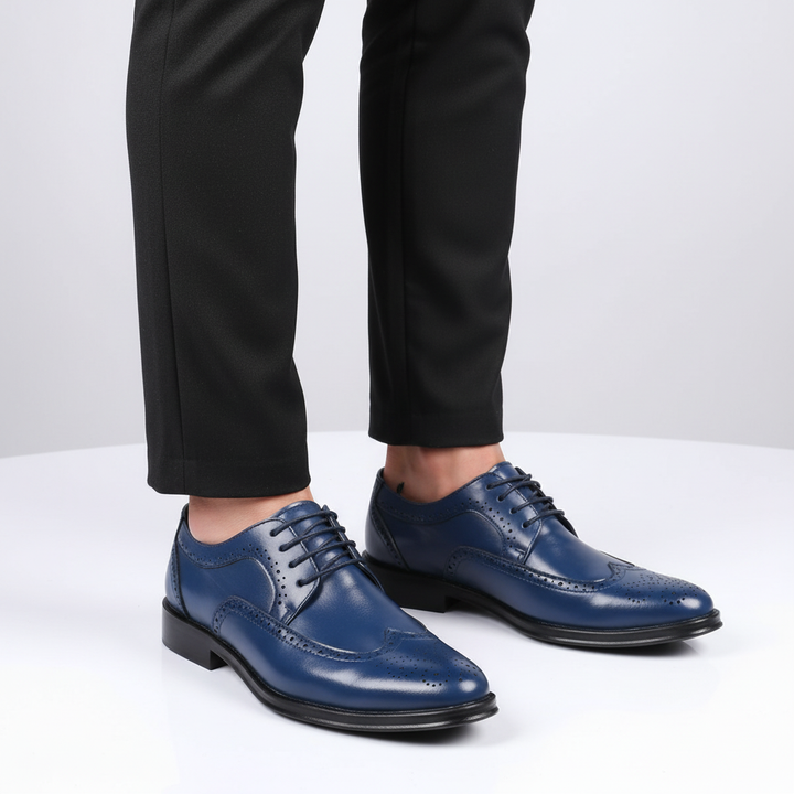 Sophisticated men's leather business shoes with intricate stitching, offering classic style and comfort.