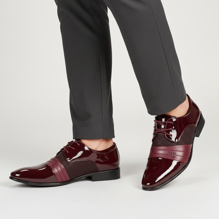 Stylish men's formal lace-up shoes in black, designed with a pointed toe for a modern, elegant look