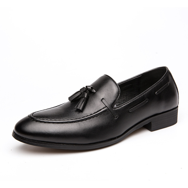 Men's formal black slip-on tassel loafers, classic and comfortable for dress or office.