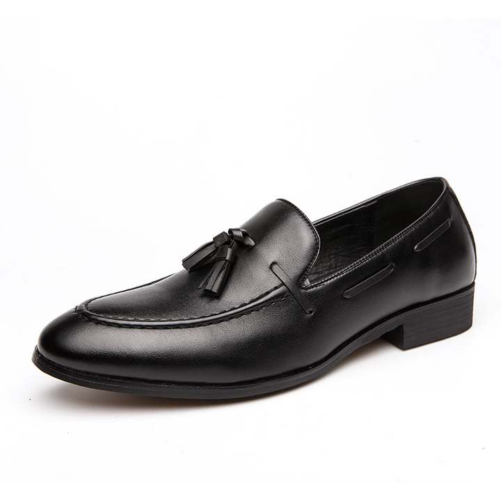 Men's formal black slip-on tassel loafers, classic and comfortable for dress or office.