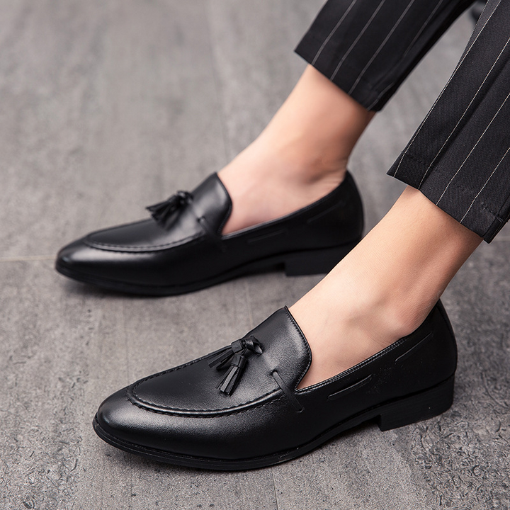 Brown men's tassel loafers, stylish slip-on dress shoes for office, formal or casual outfits.