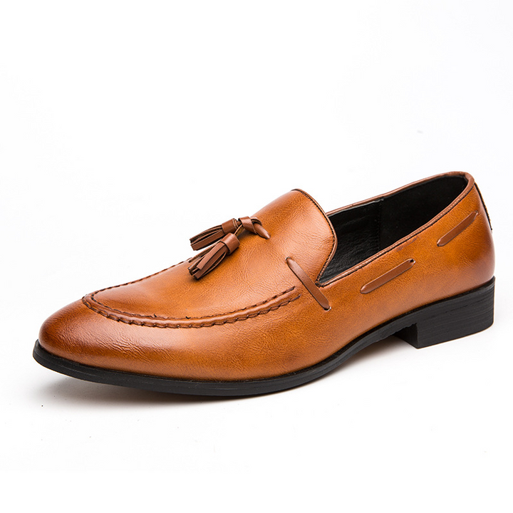 Elegant men's brown slip-on tassel loafers, perfect comfortable dress shoes for formal events.