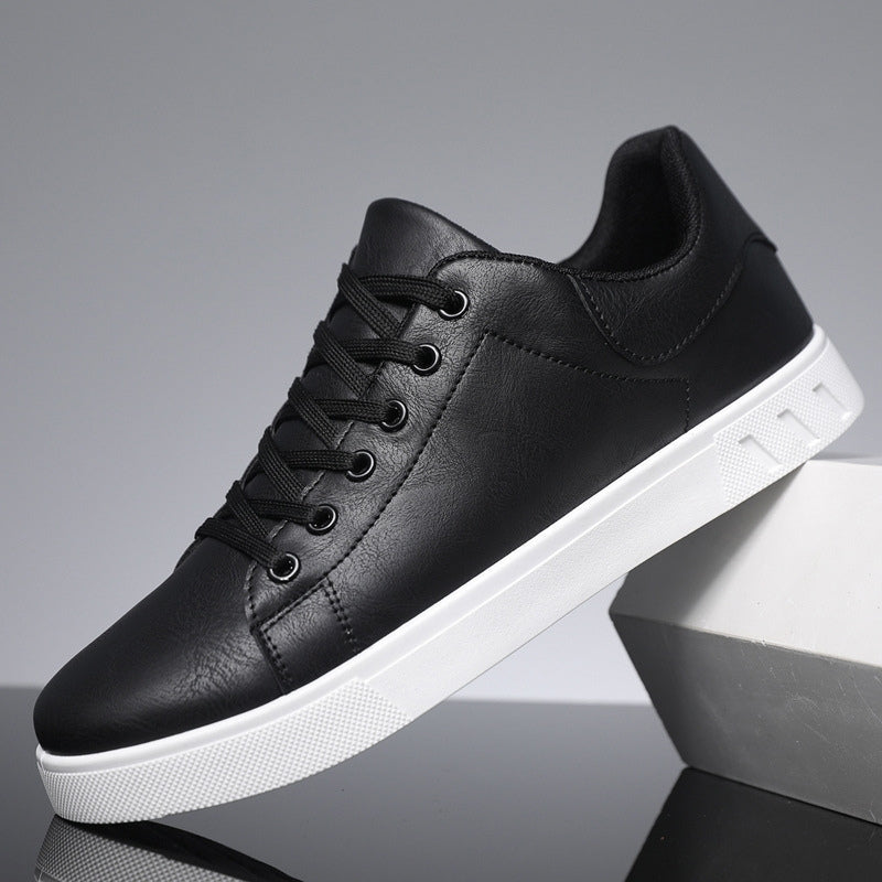 Stylish black men's sneakers, versatile for everyday fashion, comfortable walking, and casual wear.